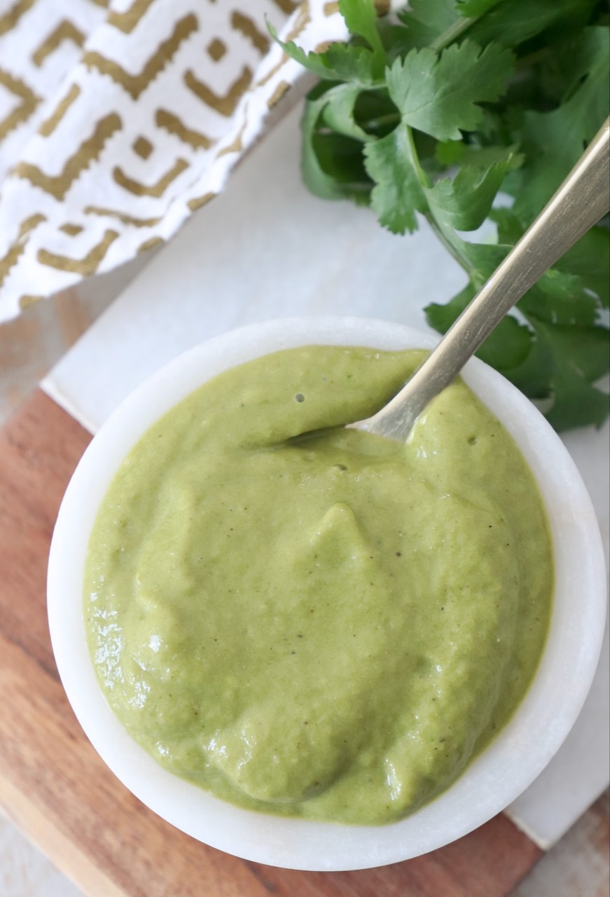 poblano sauce in small white bowl with spoon