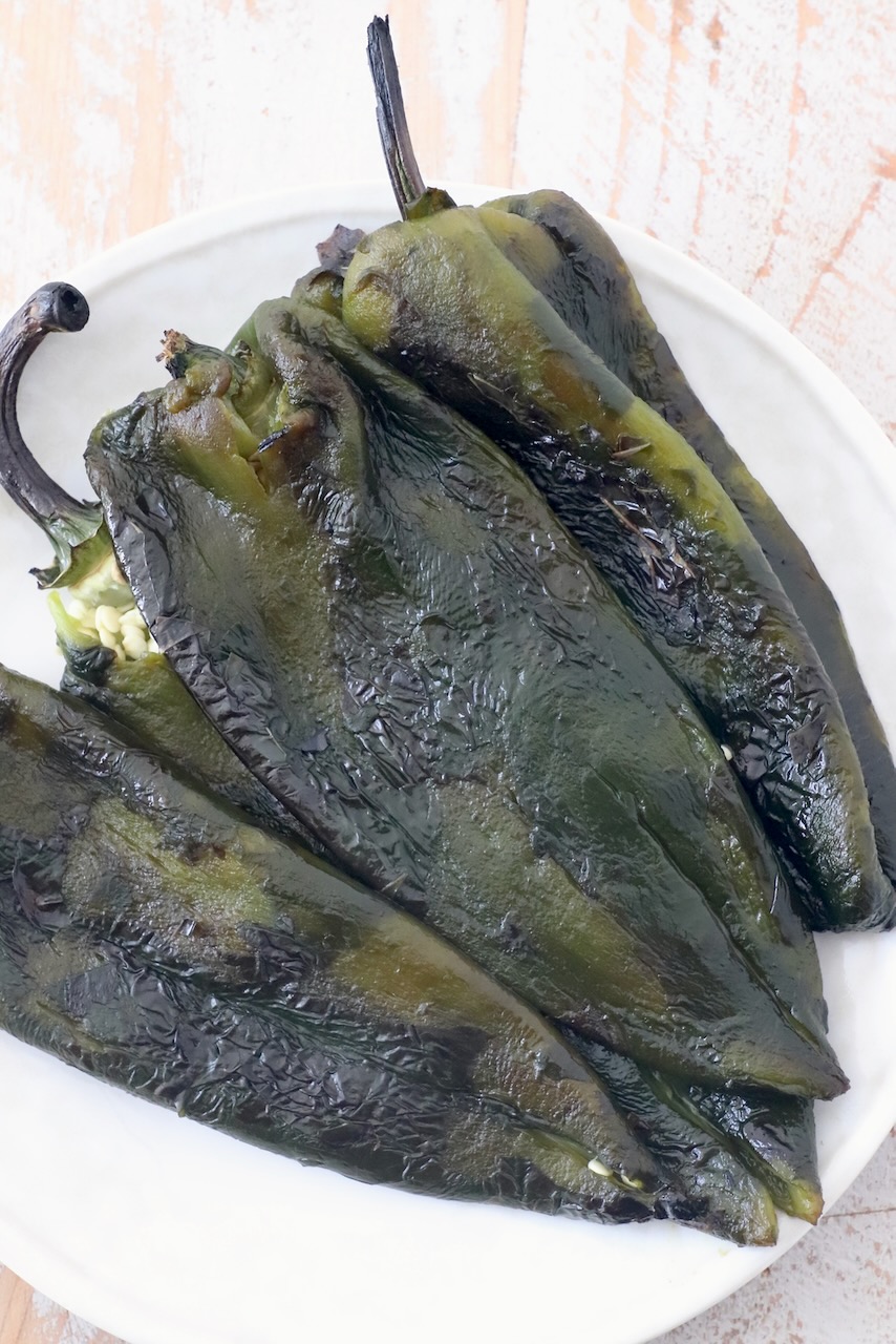 roasted poblano peppers on white plate