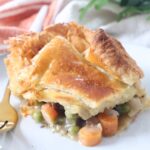 slice of pot pie on plate with fork
