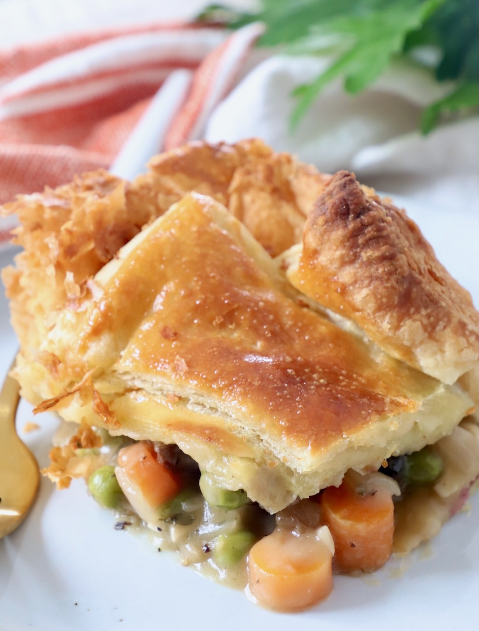 piece of vegetable pot pie on plate with fork