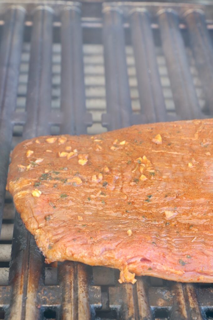 marinated flank steak on grill
