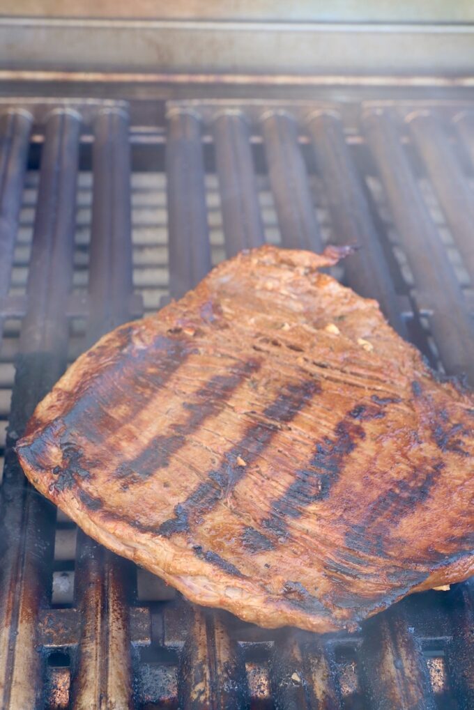 grilled flank steak on grill