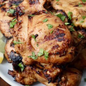 grilled chicken thighs on plate