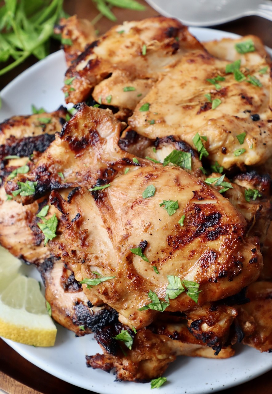 grilled chicken thighs on plate