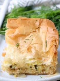 slice of zucchini pie with phyllo crust on plate