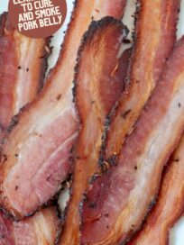 cooked strips of bacon on white plate