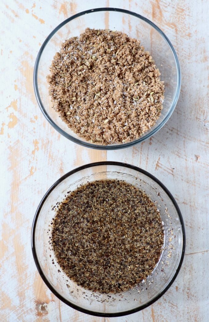 two different spice rubs for homemade bacon in glass bowls