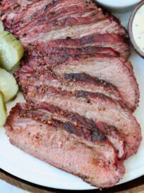 sliced smoked tri tip on plate