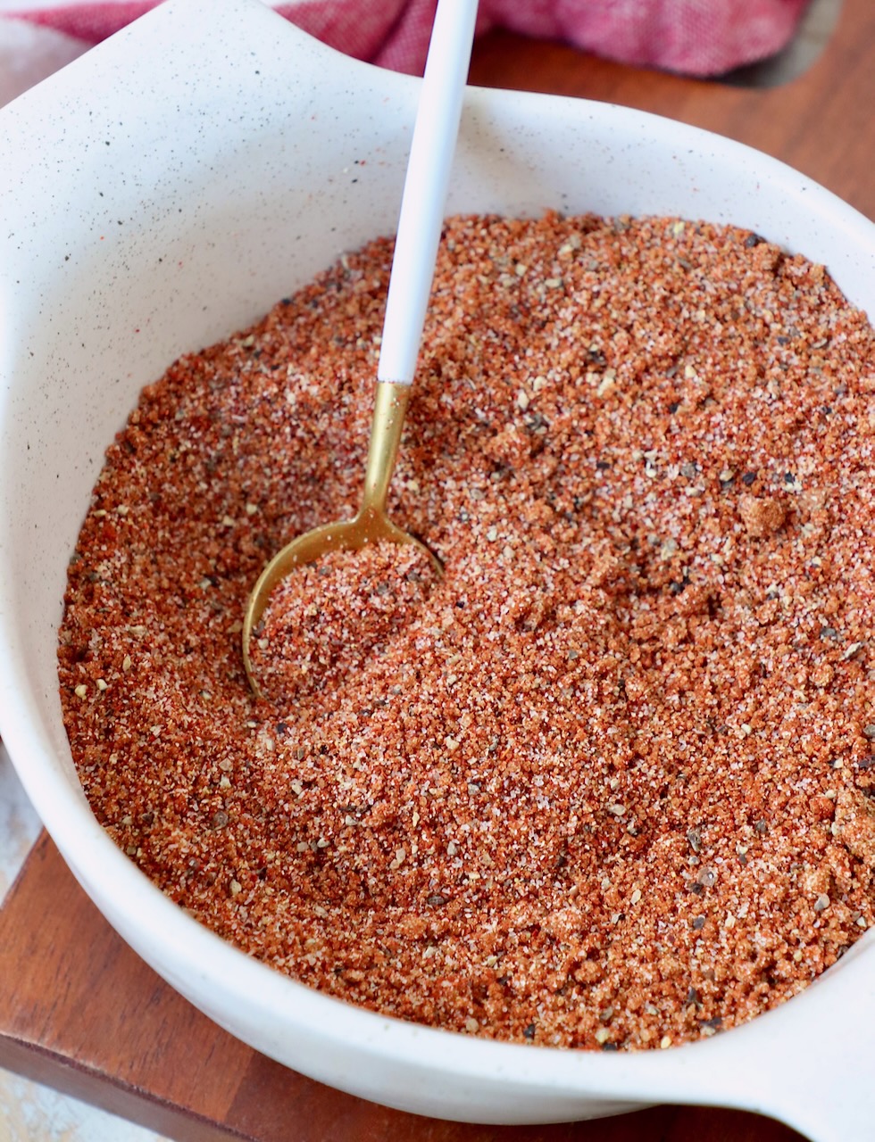 bbq seasoning blend in bowl with small spoon