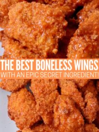 boneless chicken wings tossed with buffalo sauce on plate