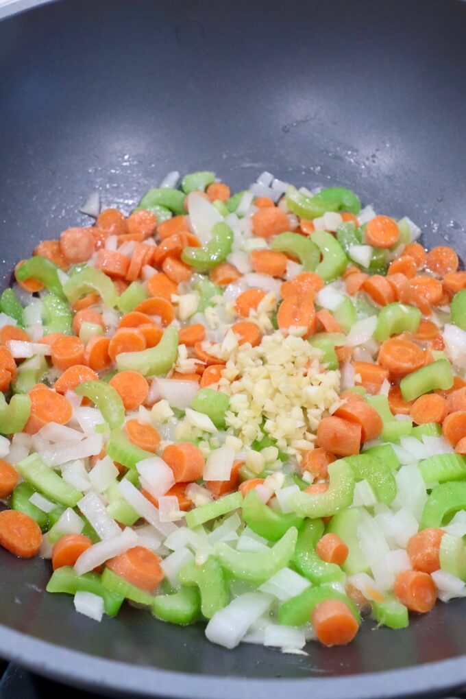 diced carrots, onions, celery and garlic in skillet