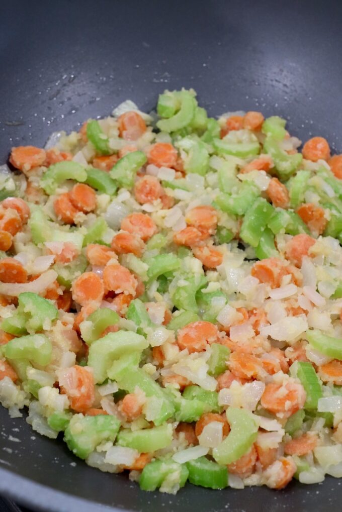 flour combined with diced vegetables in skillet