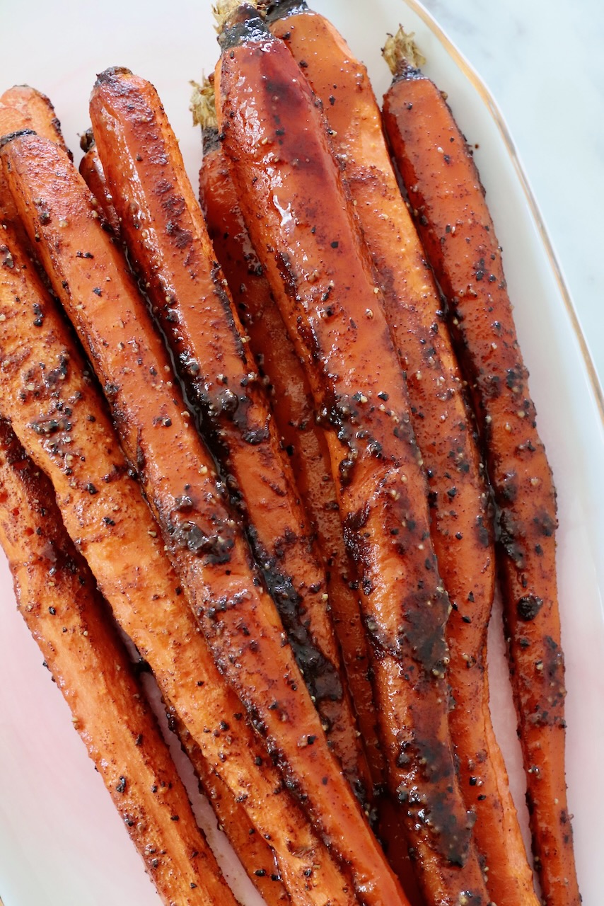 roasted, seasoned carrots on plate