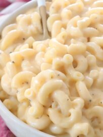 macaroni and cheese in bowl with fork