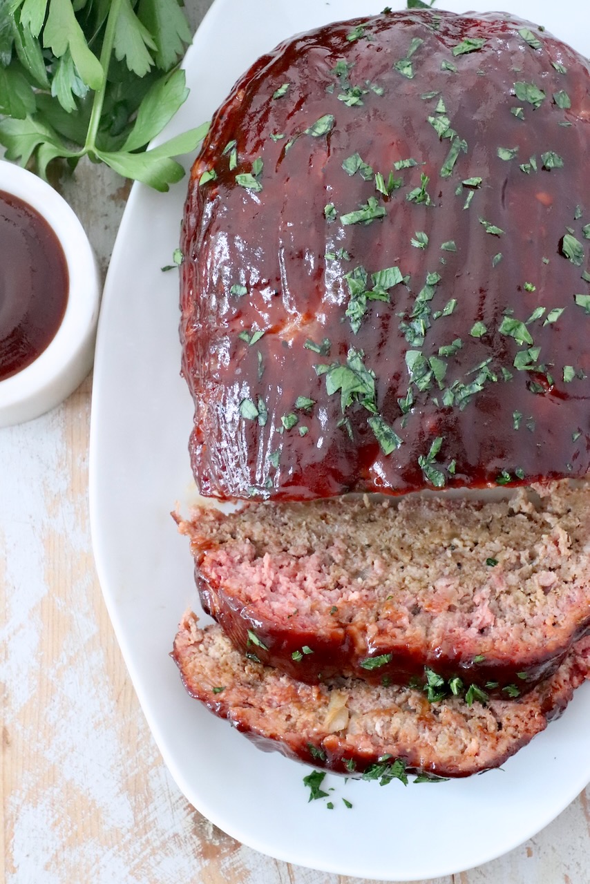 smoked, sliced bbq meatloaf on plate