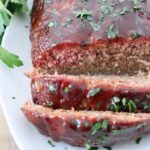 sliced, smoked meatloaf on plate