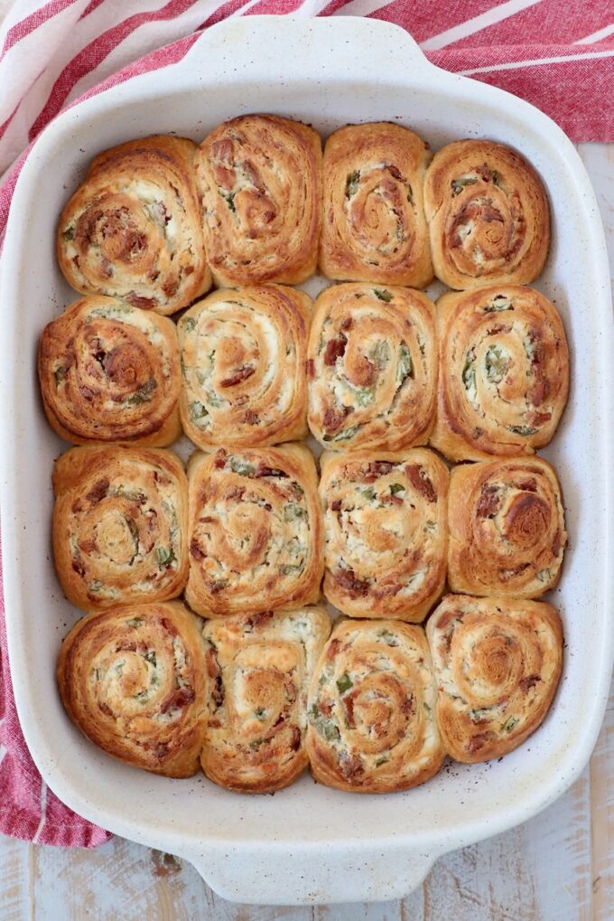 baked cheesy bacon crescent rolls in a casserole dish