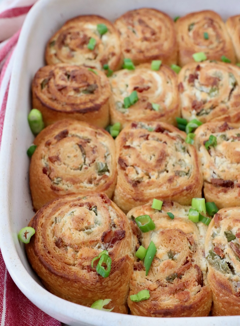 baked cheesy bacon crescent rolls in a casserole dish
