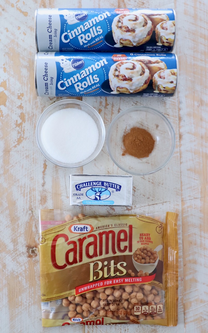 ingredients for pull apart cinnamon rolls on white wood board
