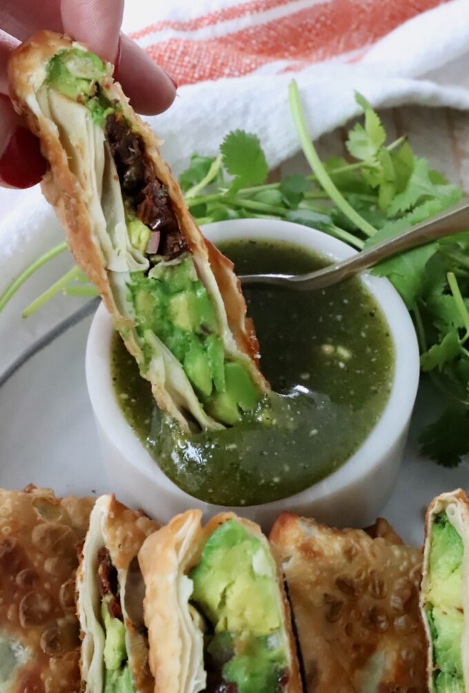 avocado egg roll dipped in tamarind cashew sauce