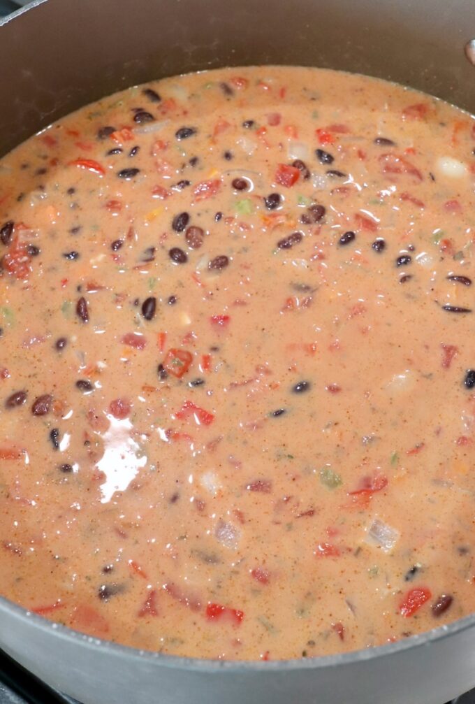 black bean soup in a large pot on the stove