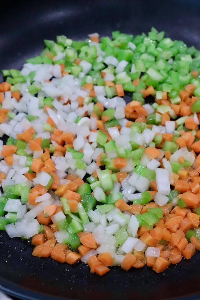 diced onions, carrots and celery in a skillet