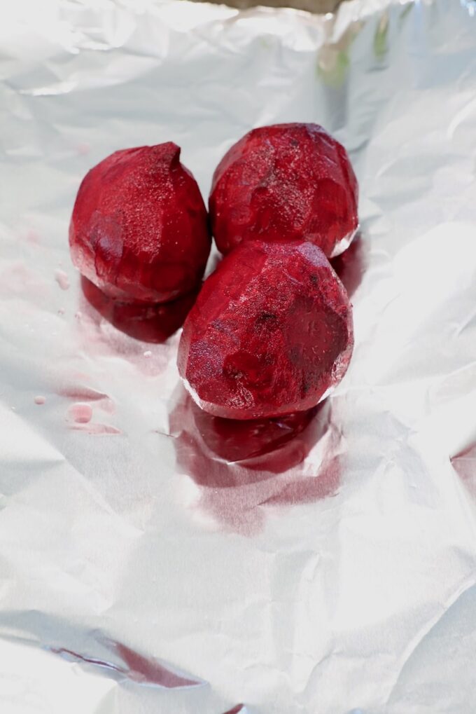 raw peeled beets on a piece of foil