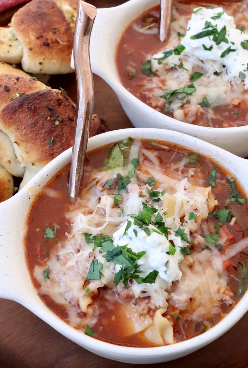 lasagna soup in bowls with spoons
