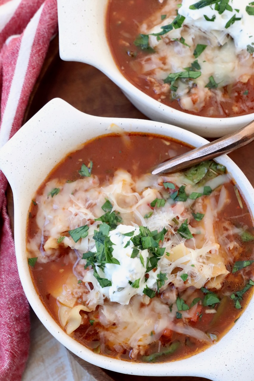 lasagna soup in bowls with spoon