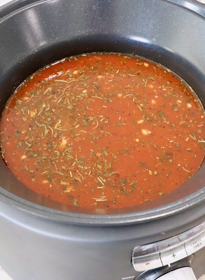 Italian seasoned tomato sauce in slow cooker