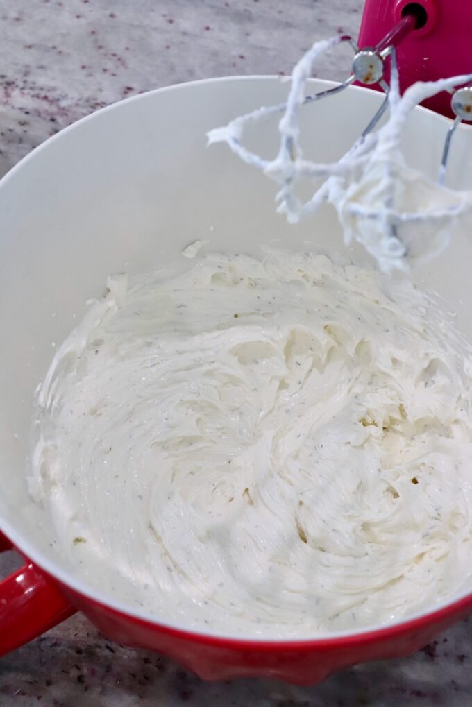 seasoned sour cream and cream cheese mixed together in a large bowl