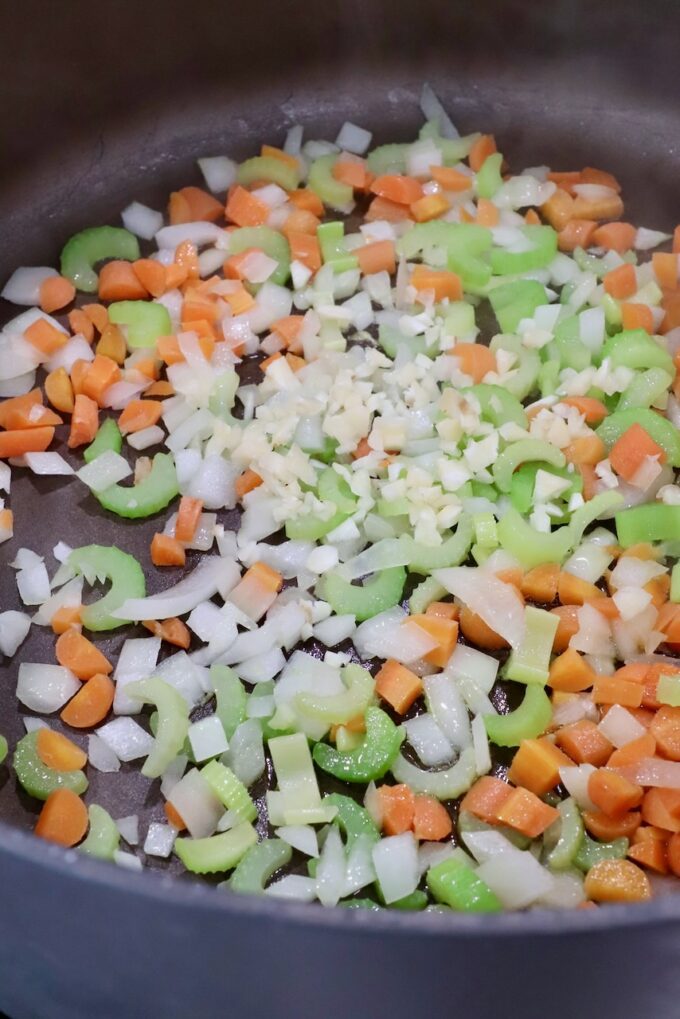 diced onions, carrots, celery and minced garlic in large pot