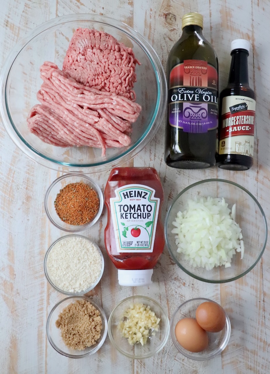 ingredients for crock pot meatloaf on white wood board