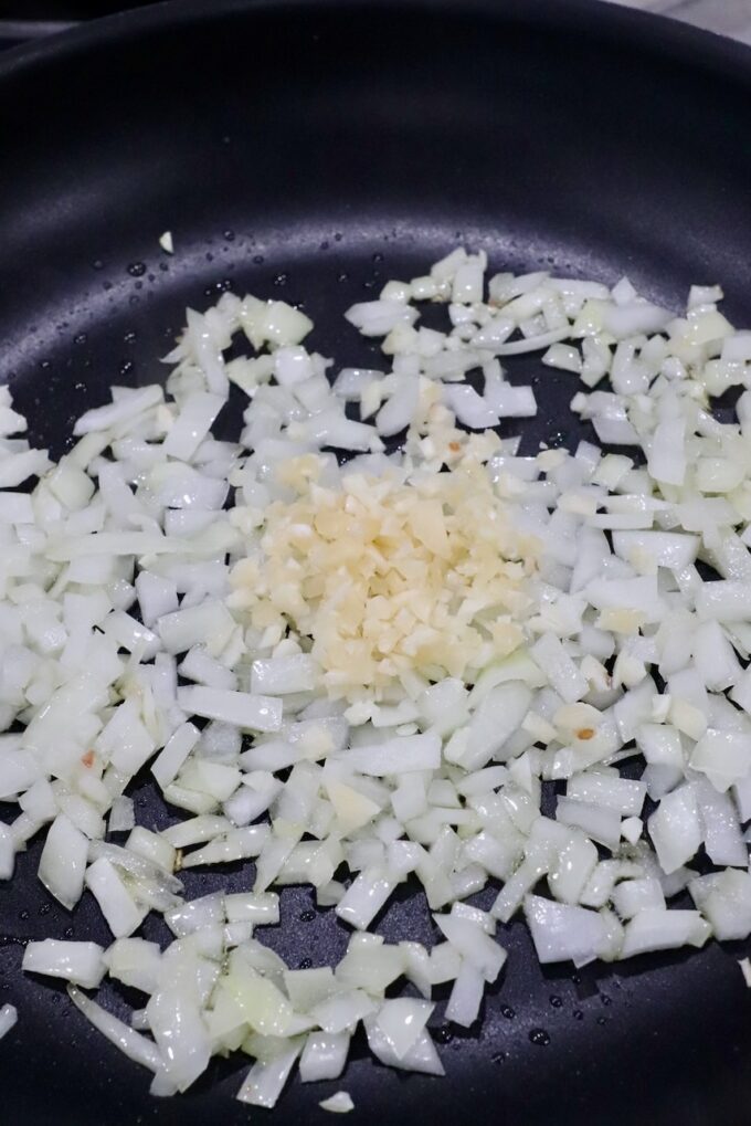 diced onions and minced garlic in a skillet