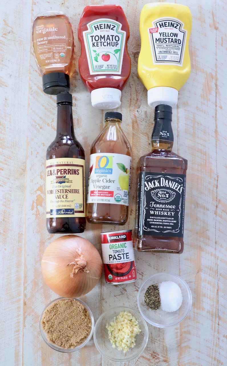 ingredients for Jack Daniels bbq sauce on white wood board