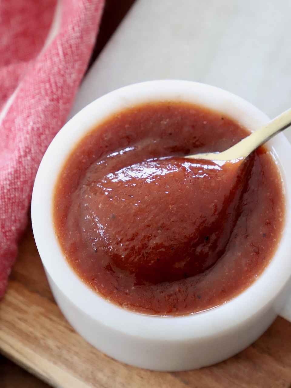 bbq sauce in small bowl with spoon