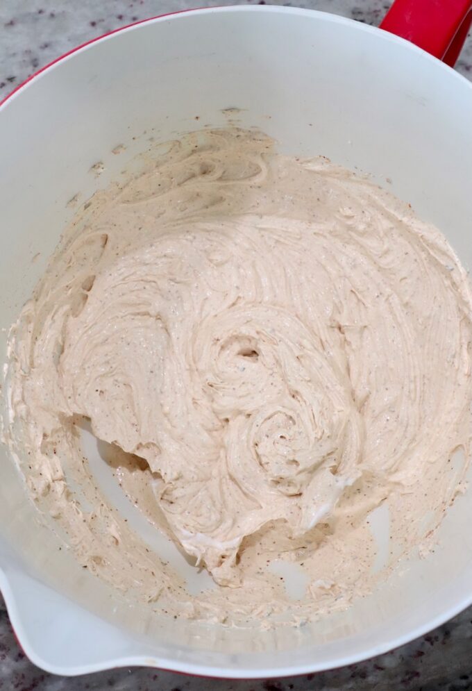 cream cheese, sour cream and spices blended together in large bowl