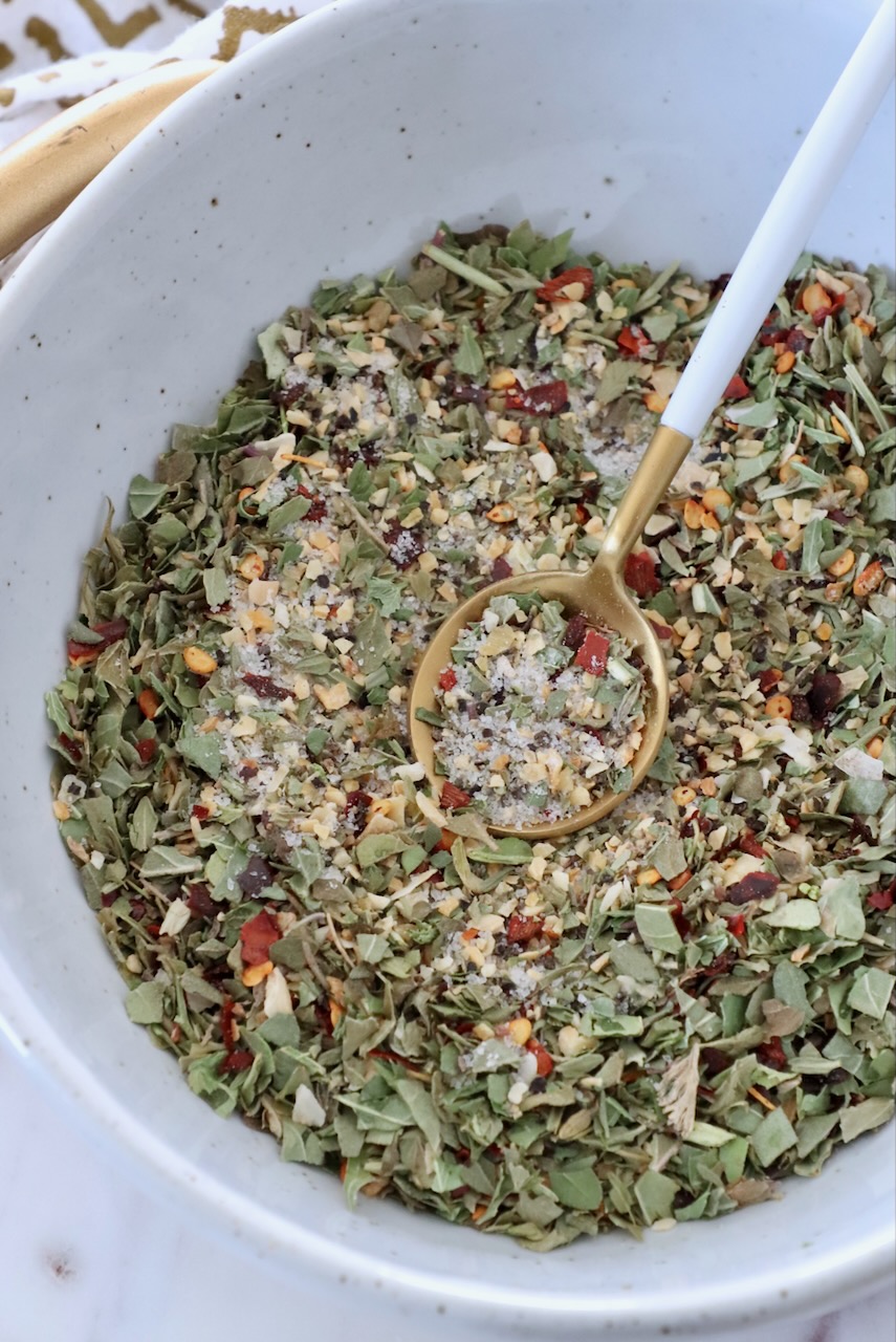 Italian dressing seasoning mix in bowl with spoon