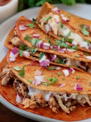 chicken birria tacos on plate