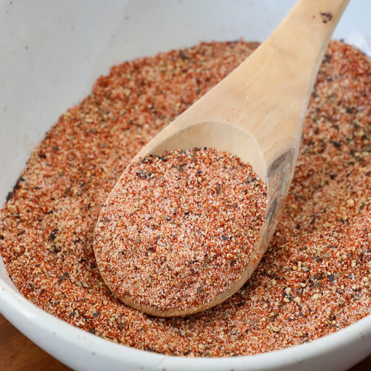 hamburger seasoning in bowl with spoon