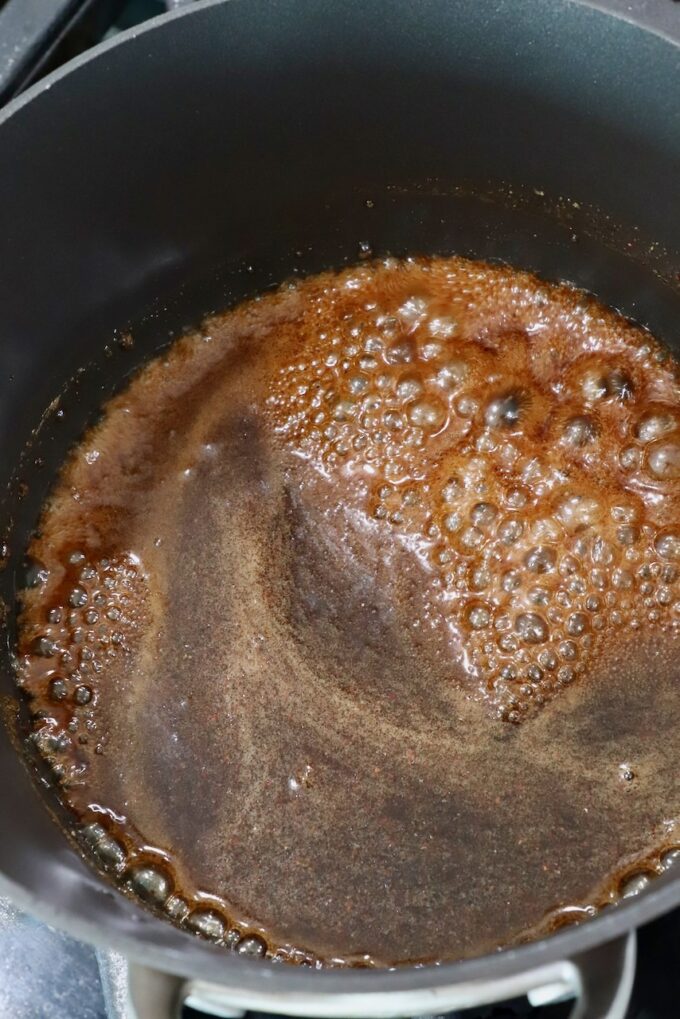 brown sugar glaze in saucepan on the stove