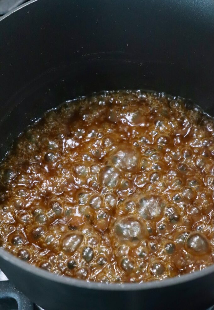 miso glaze bubbling in pot on the stove
