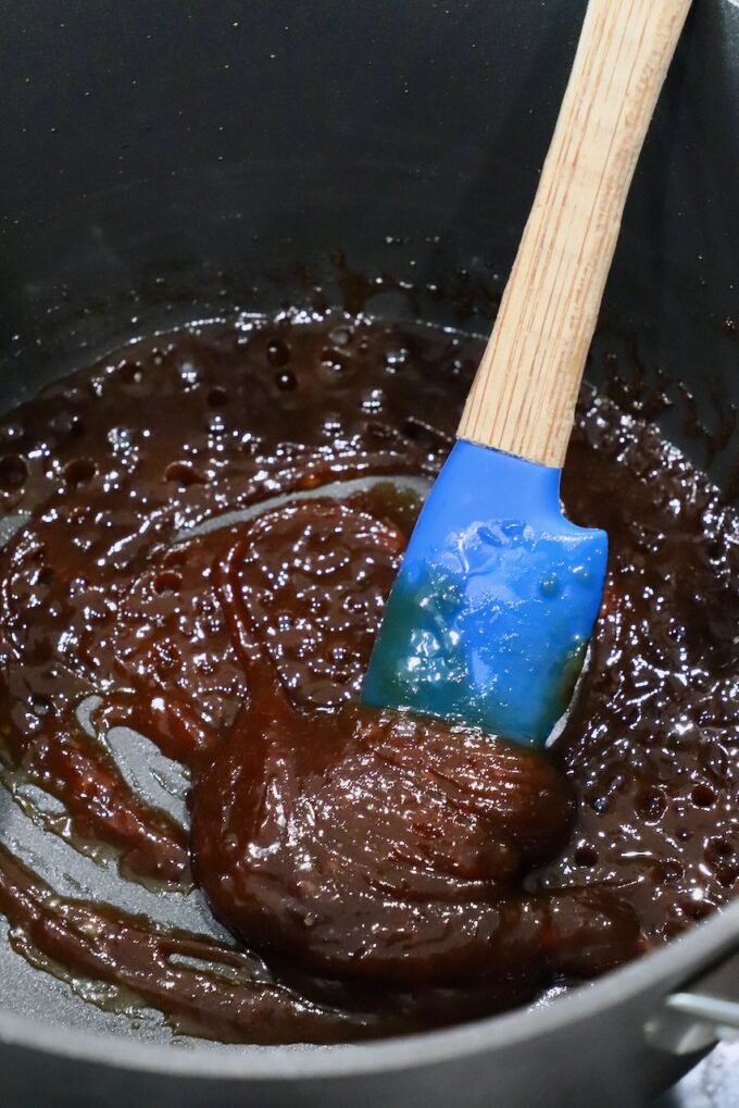 thick miso glaze in pot with spatula