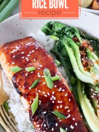 cooked glazed salmon in a bowl with rice and bok choy