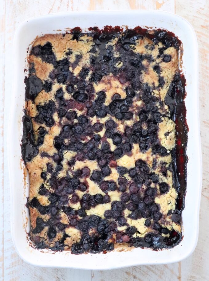 cooked blueberry dump cake in baking dish