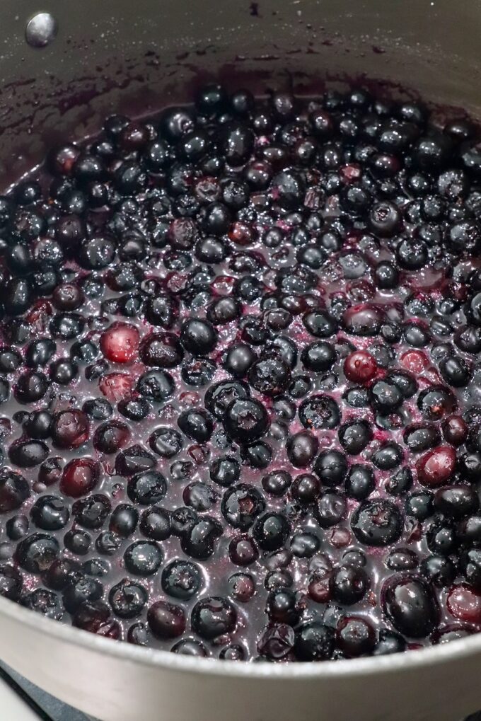 blueberries in liquid in pan