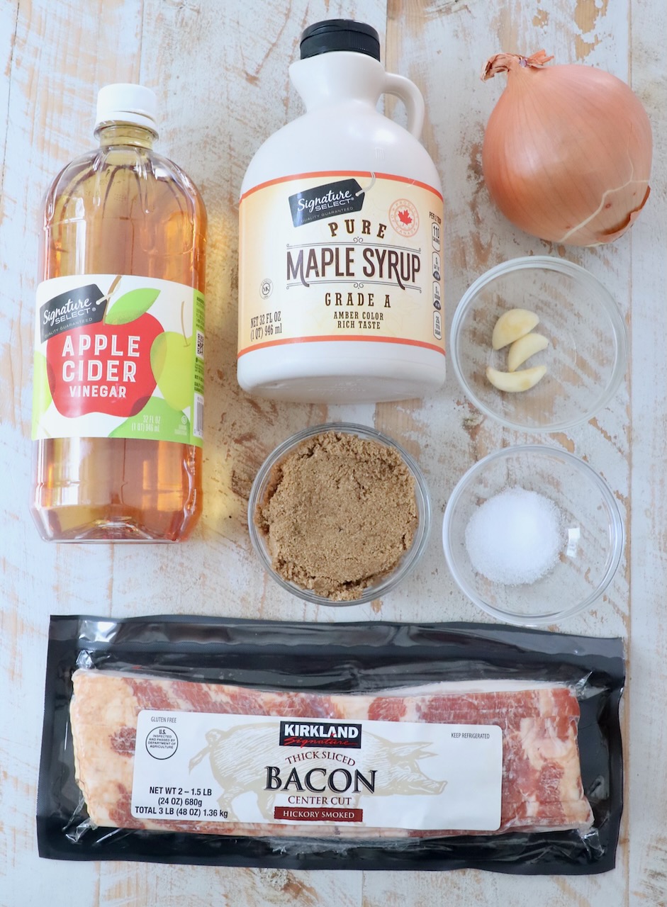 ingredients for bacon jam on white wood board