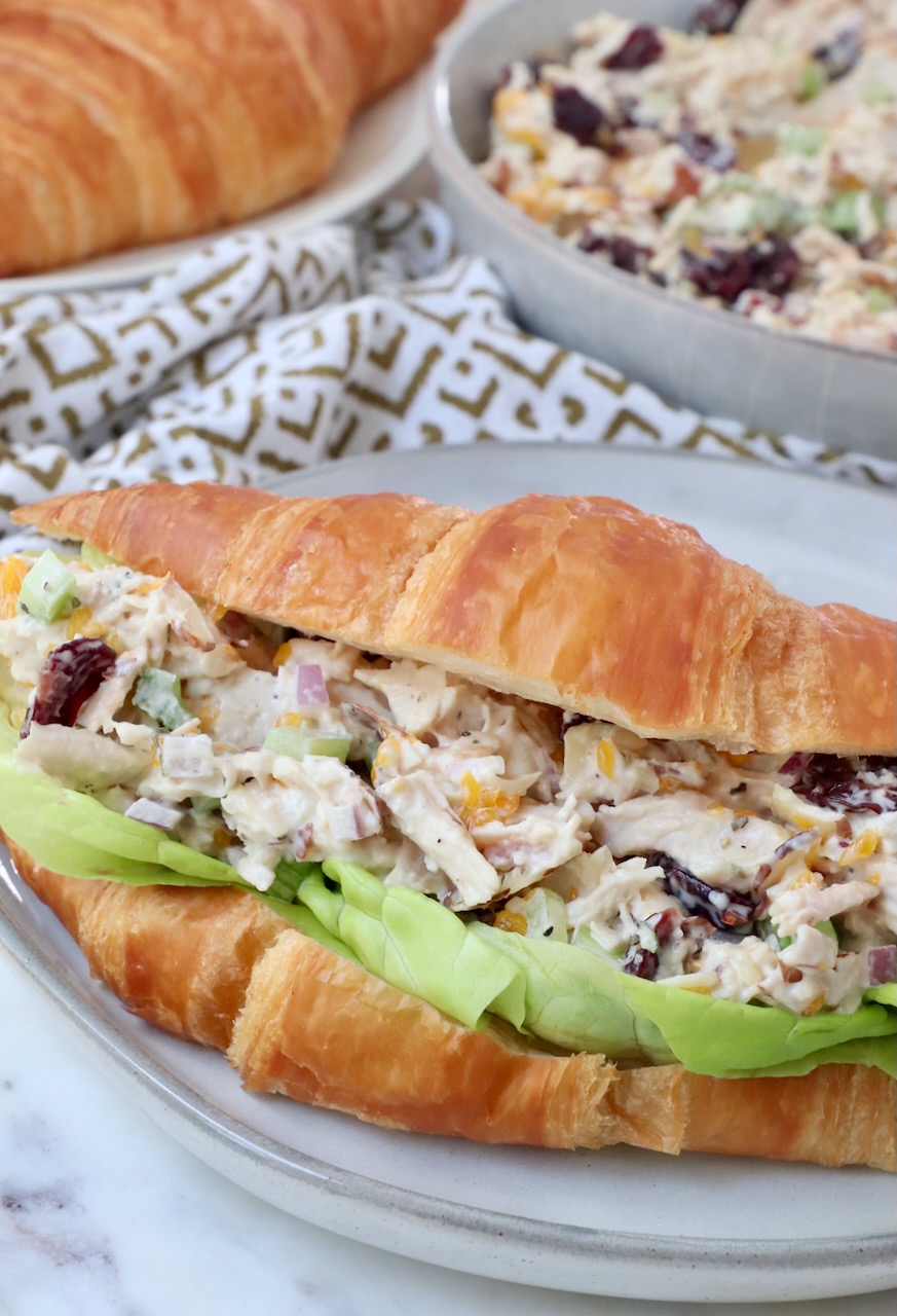 chicken salad with lettuce on croissant