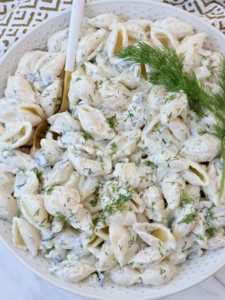 pickle pasta salad in bowl with dill