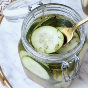 pickle chips in glass jar with fork